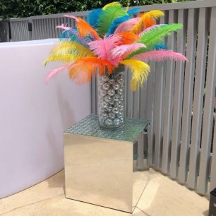 mirrored cubes with disco centerpiece and rainbow feathers