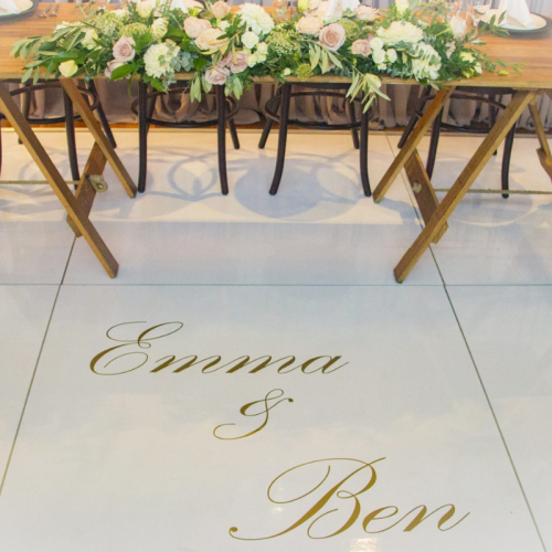 white dance floor with emma and ben decal