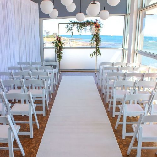 white carpet aisle wedding ceremony