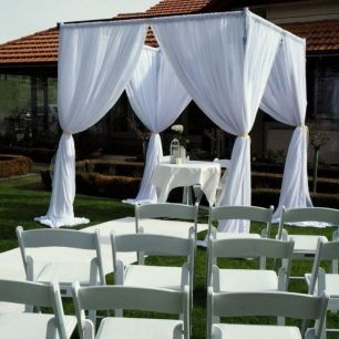 White Canopy over Wedding Ceremony