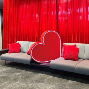 Light up heart next to couches