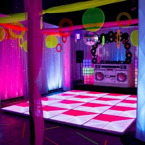 70s party with led dancefloor with retro dj booth