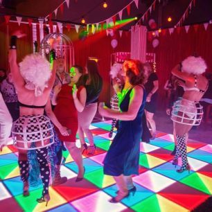 dancing on the LED dancefloor at Circus Themed party