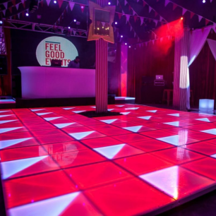 Red LED dancefloor at circus themed party 