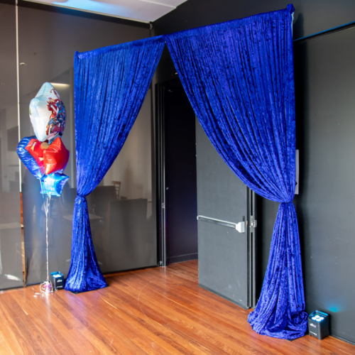 royal blue crushed velvet drape entranceway