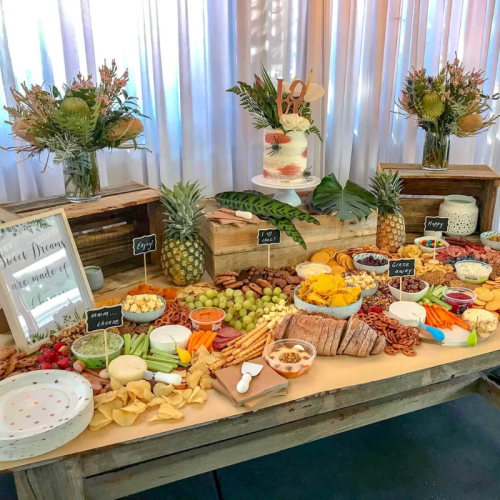 charcuterie table and cake table