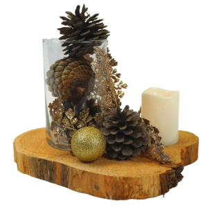 gold bauble wooden slice and pinecones