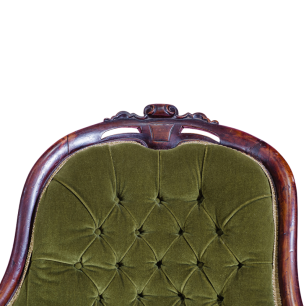 close up of top of antique emerald chaise lounge