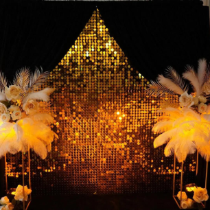 black and gold sequin backdrop florals