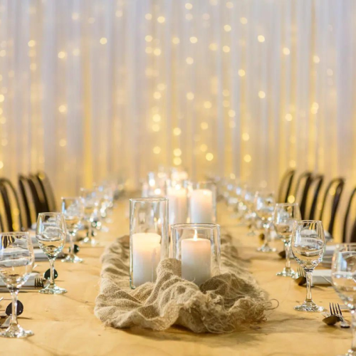 wedding reception dining table fairy light backdrop