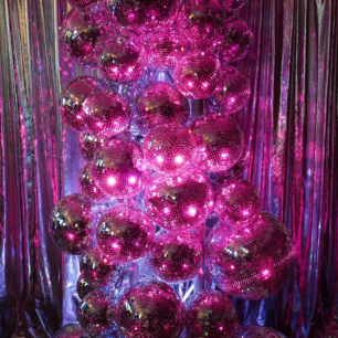 close up pink disco ball tree