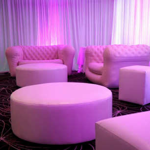inflatable sofa and round ottomans pink lighting