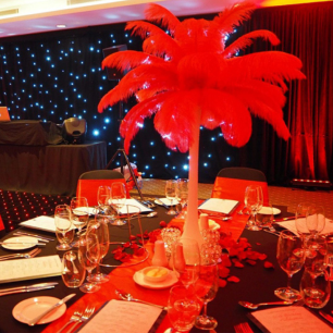 black round table cloth with red styling