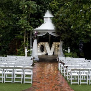 outdoor wedding ceremony big LOVE letters