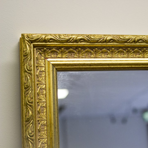 extra large gold mirror close up