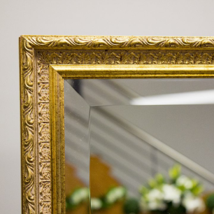 close up gold mirror frame