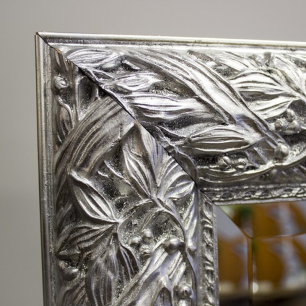 silver ornate framed mirror