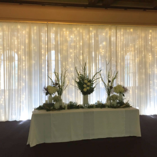 wedding ivory table and draping