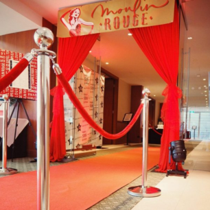 Moulin Rouge Party Entrance With Red Chiffon Drape