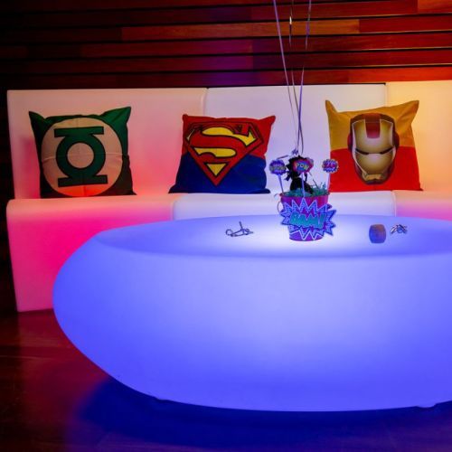 superhero party with oval coffee table